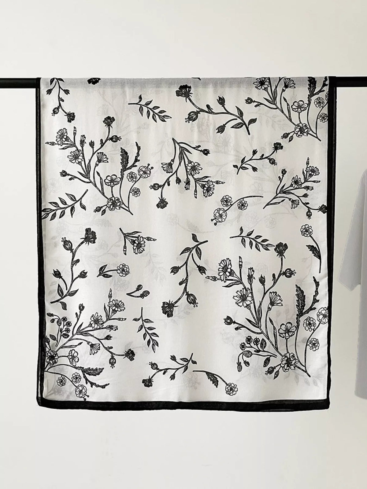 Lightweight floral scarf shown at full length