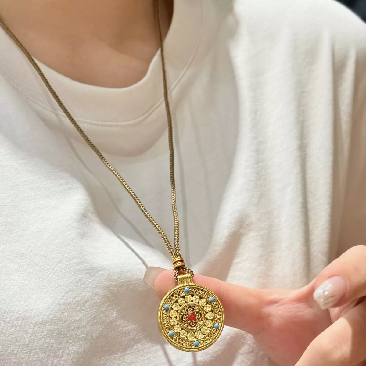 Gold plated pendant necklace chain close up
