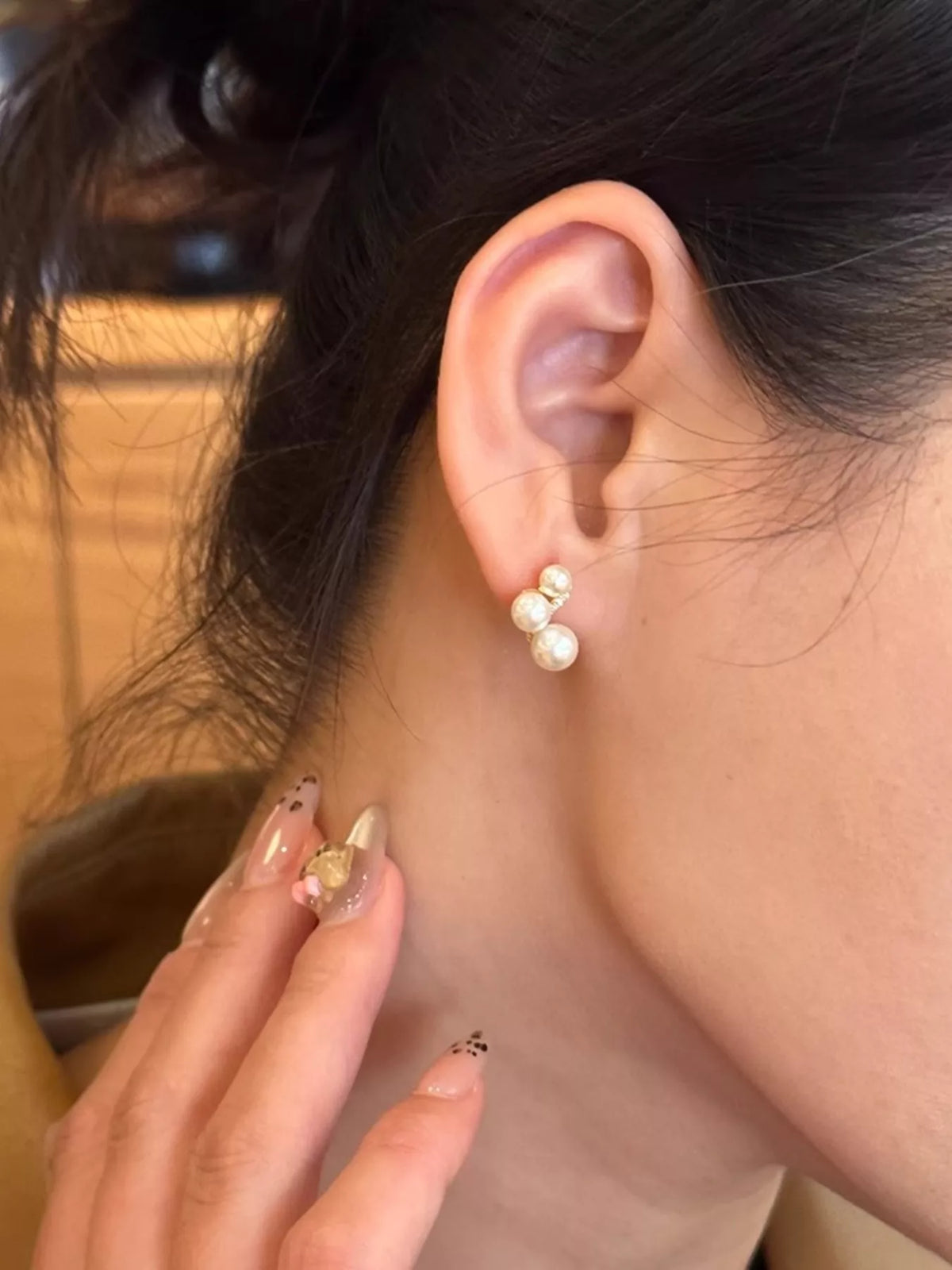 White pearl cluster stud earrings side view