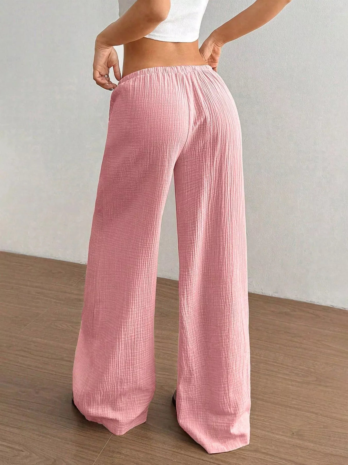 Wide leg drawstring pants from a seated pose