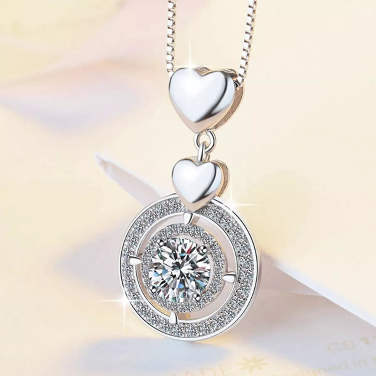 Close up of the moissanite pendant stone and setting