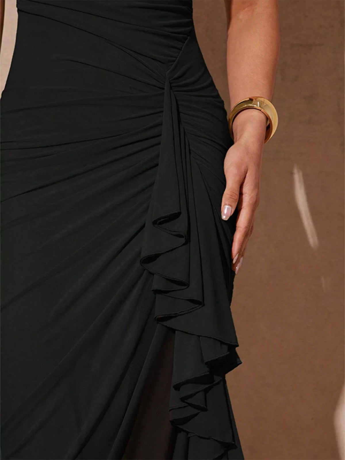 Spaghetti strap and ruched bodice detail