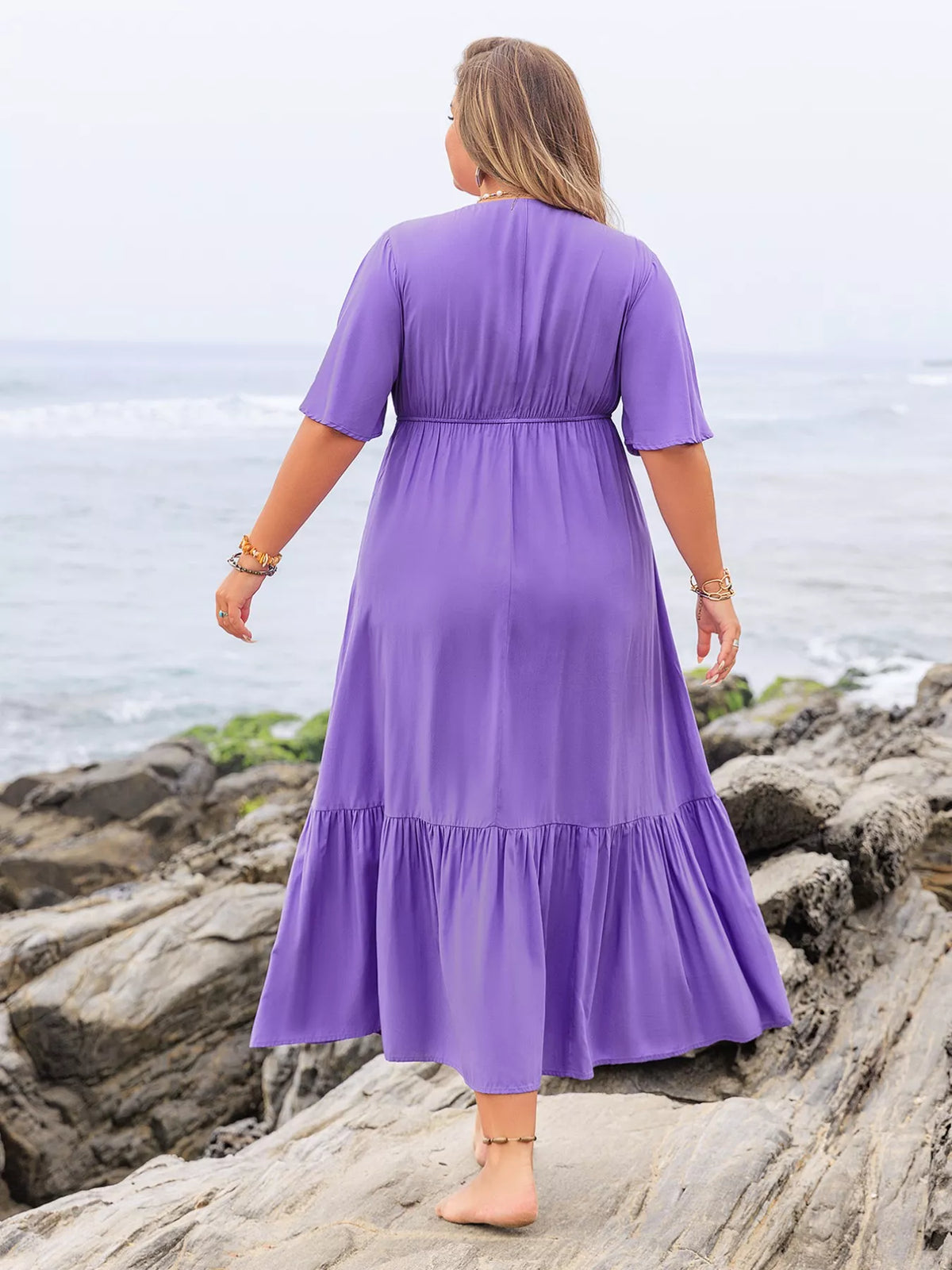Flutter sleeve detail on tiered maxi dress