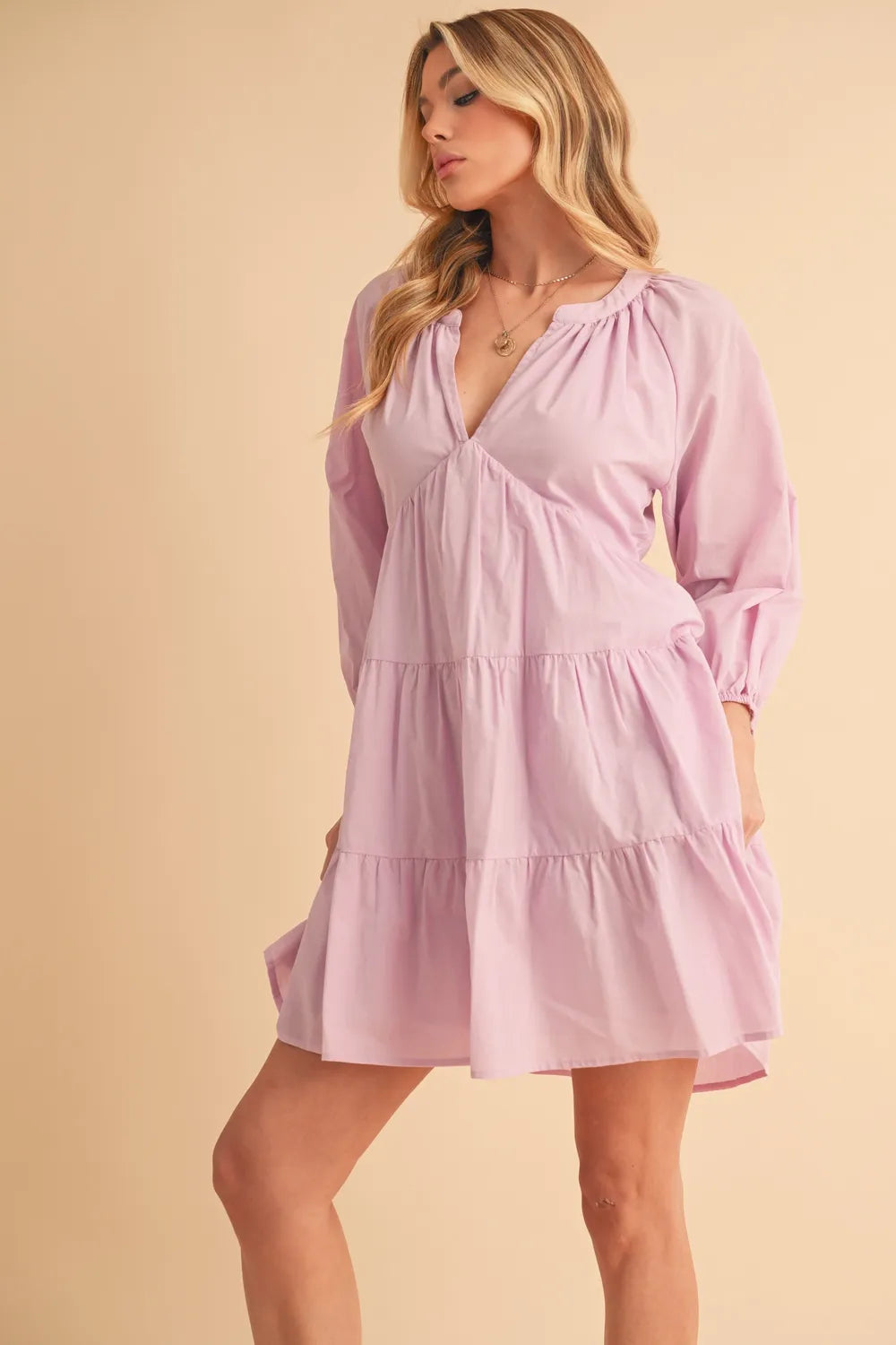 Balloon sleeve tiered dress full length on model