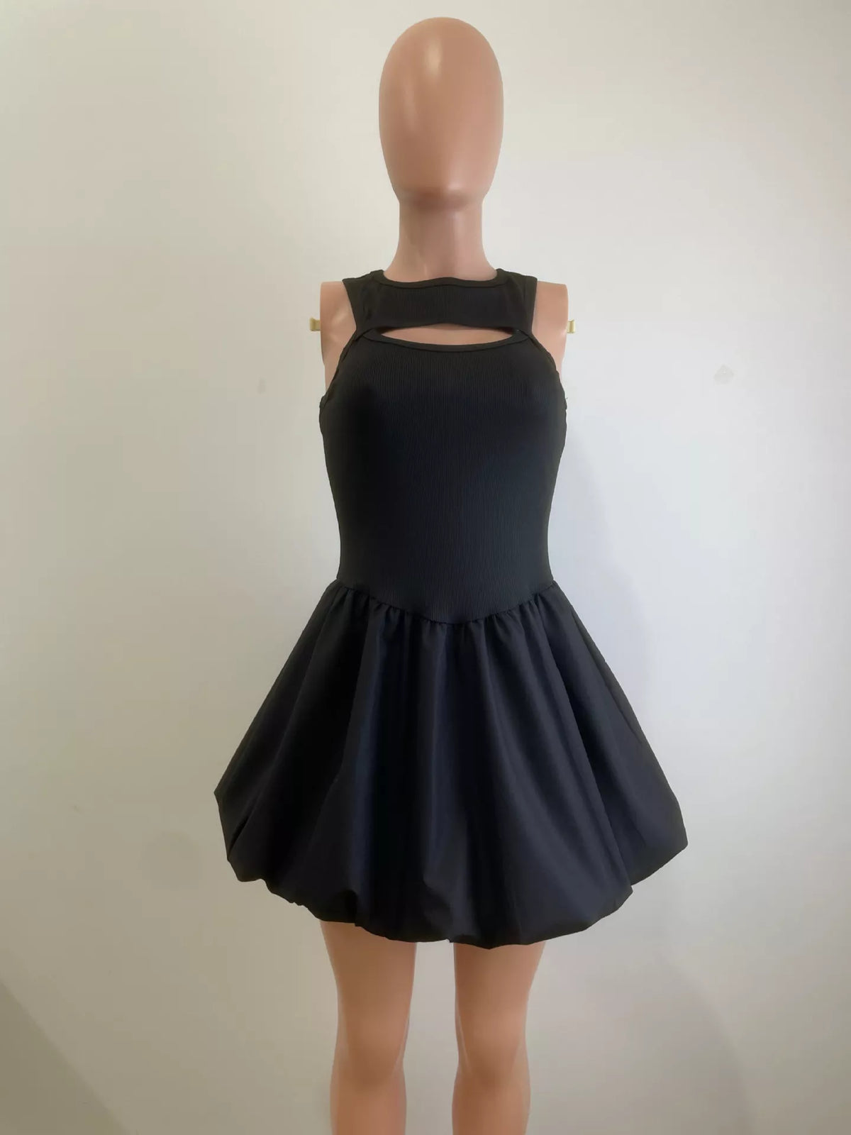 Full length styling of the cut out bubble hem dress