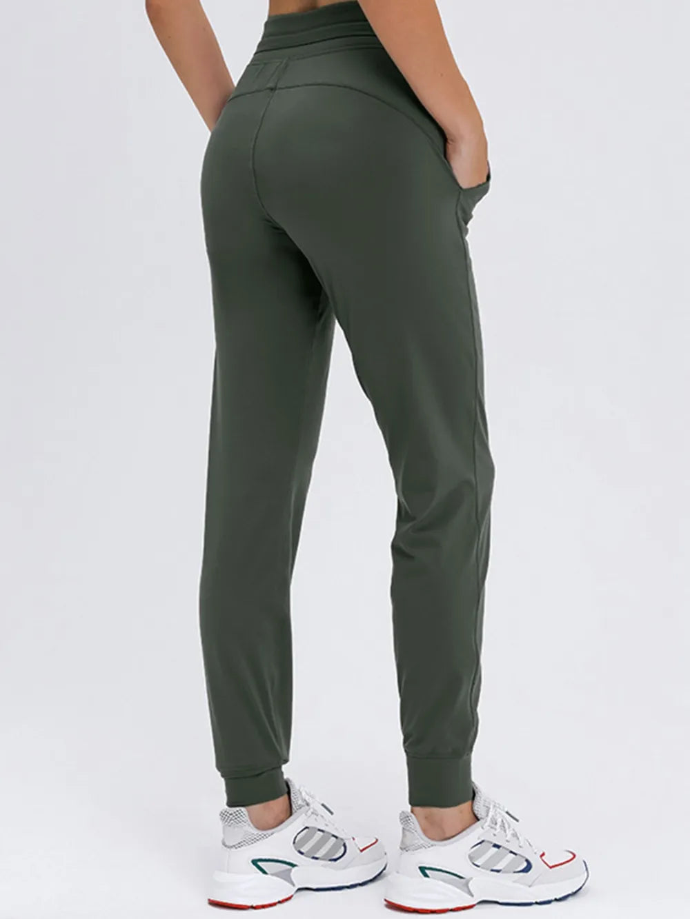 Tied joggers with pockets, knit detail