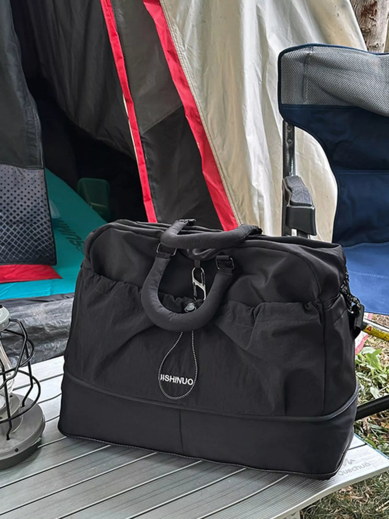 Black drawstring color block nylon duffel bag front view