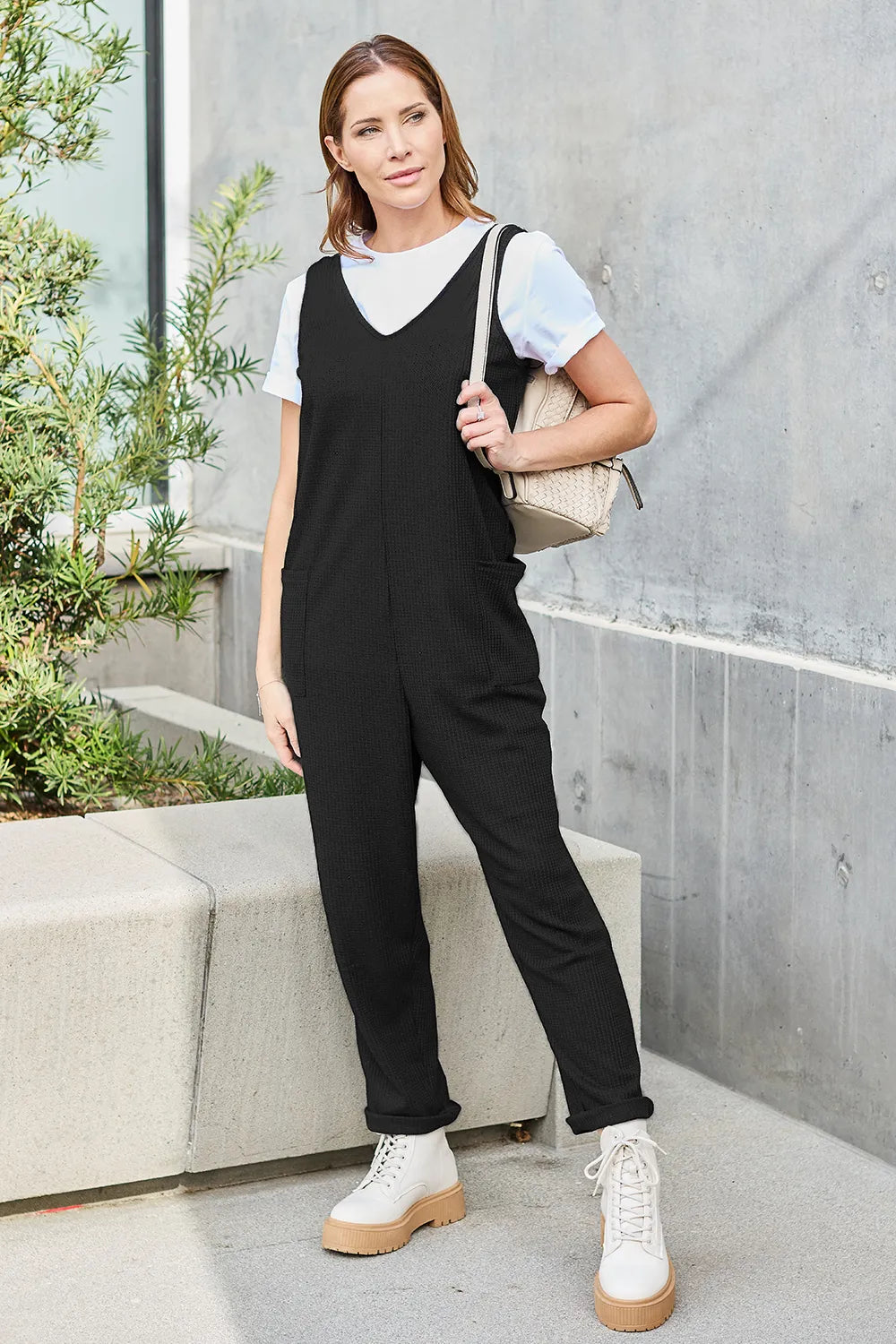 Sleeveless jumpsuit angled view