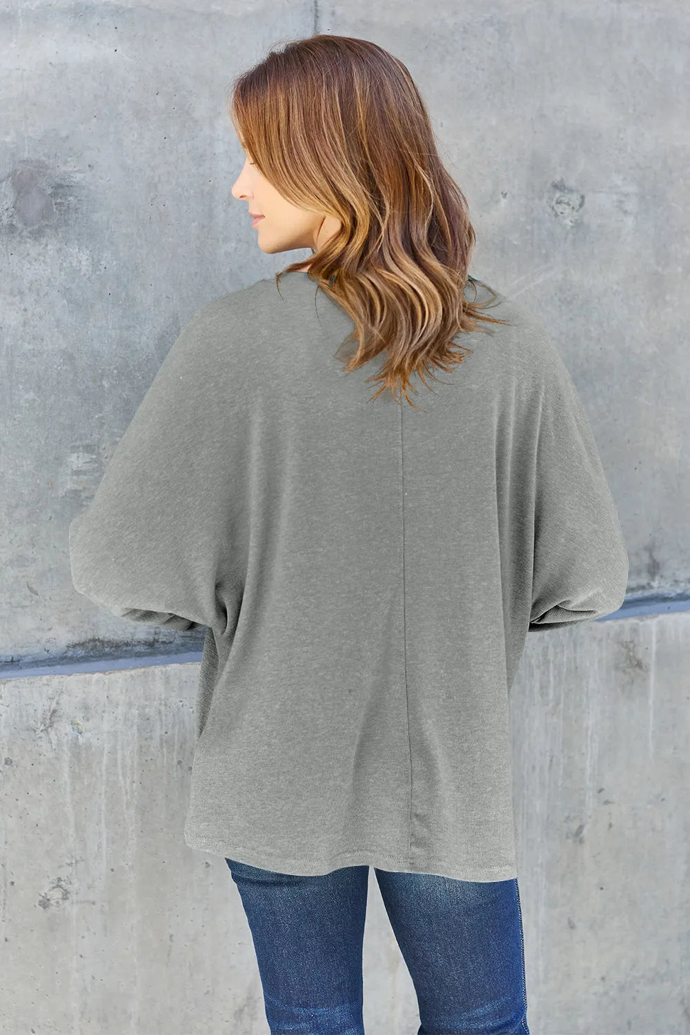 Full outfit view of the round neck long sleeve tee