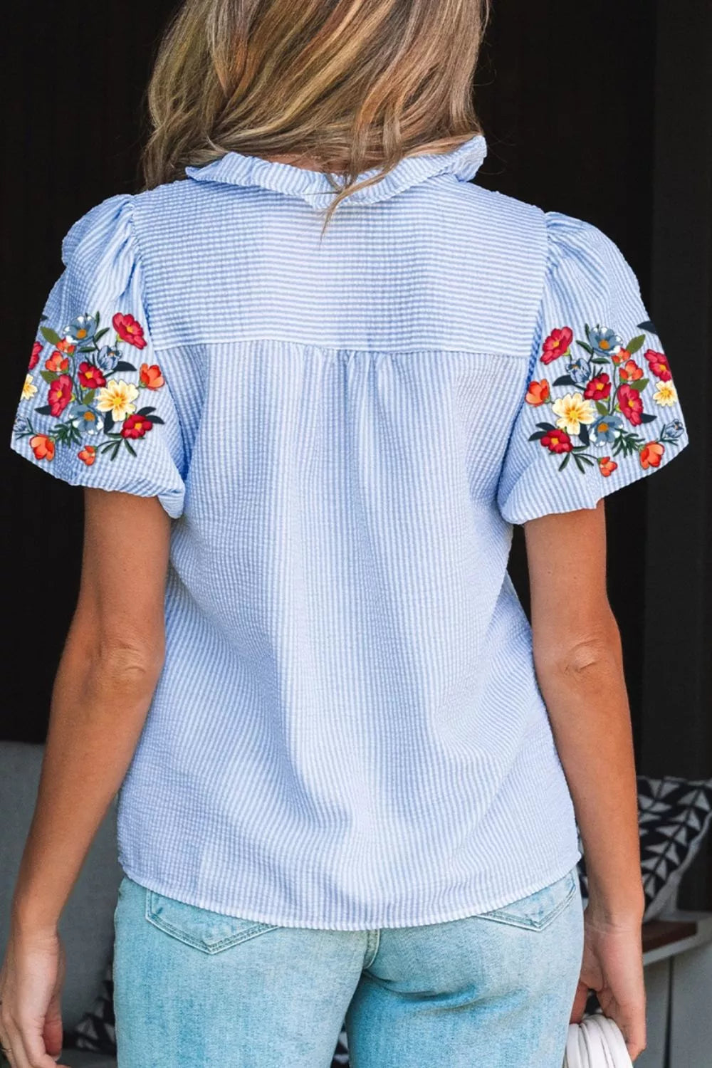 Light blue striped floral embroidered puff sleeve shirt side view