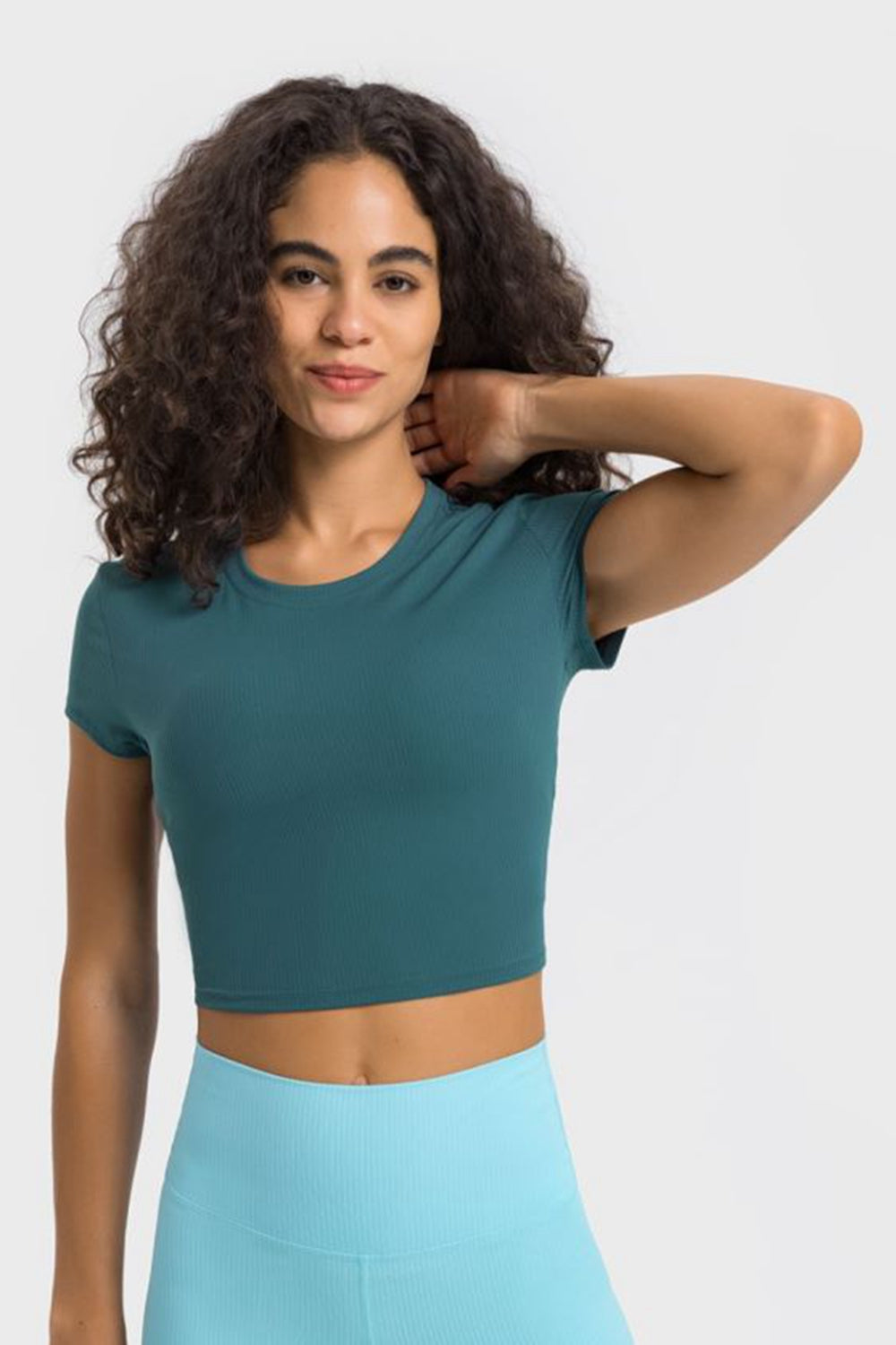 Round neck cropped sports t-shirt editorial view