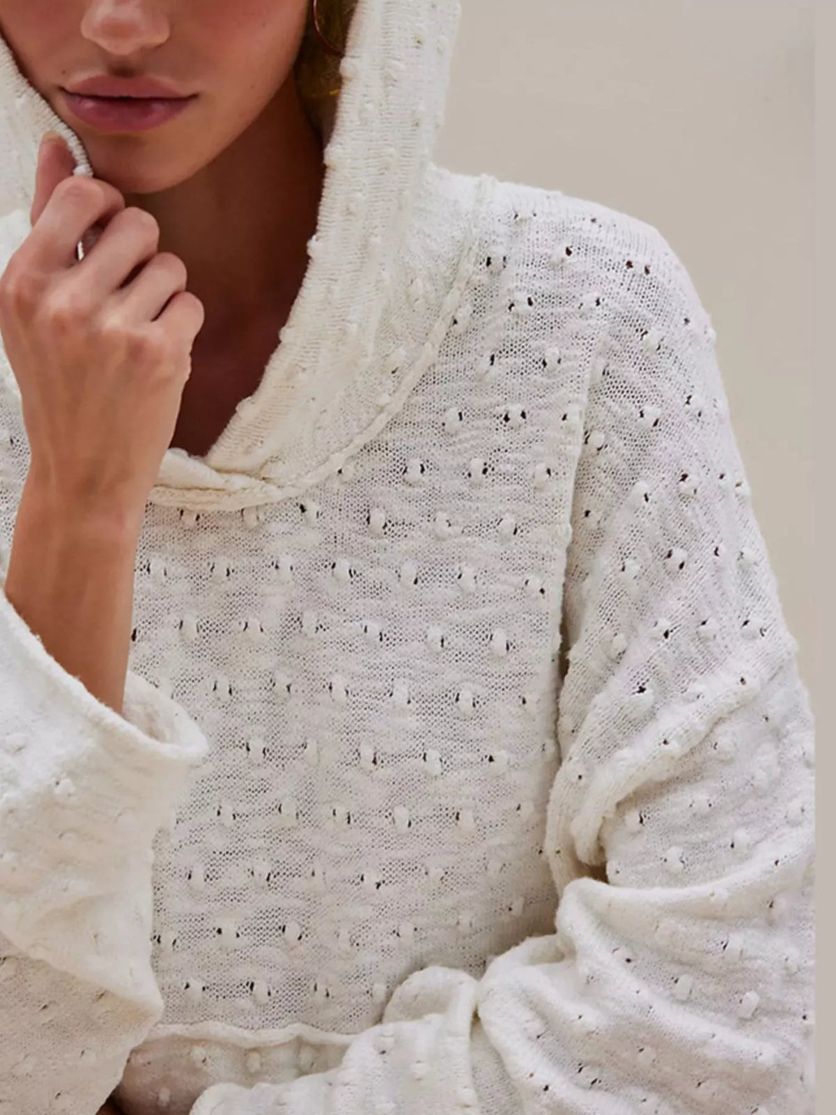 Textured dot knit hooded sweater close up detail