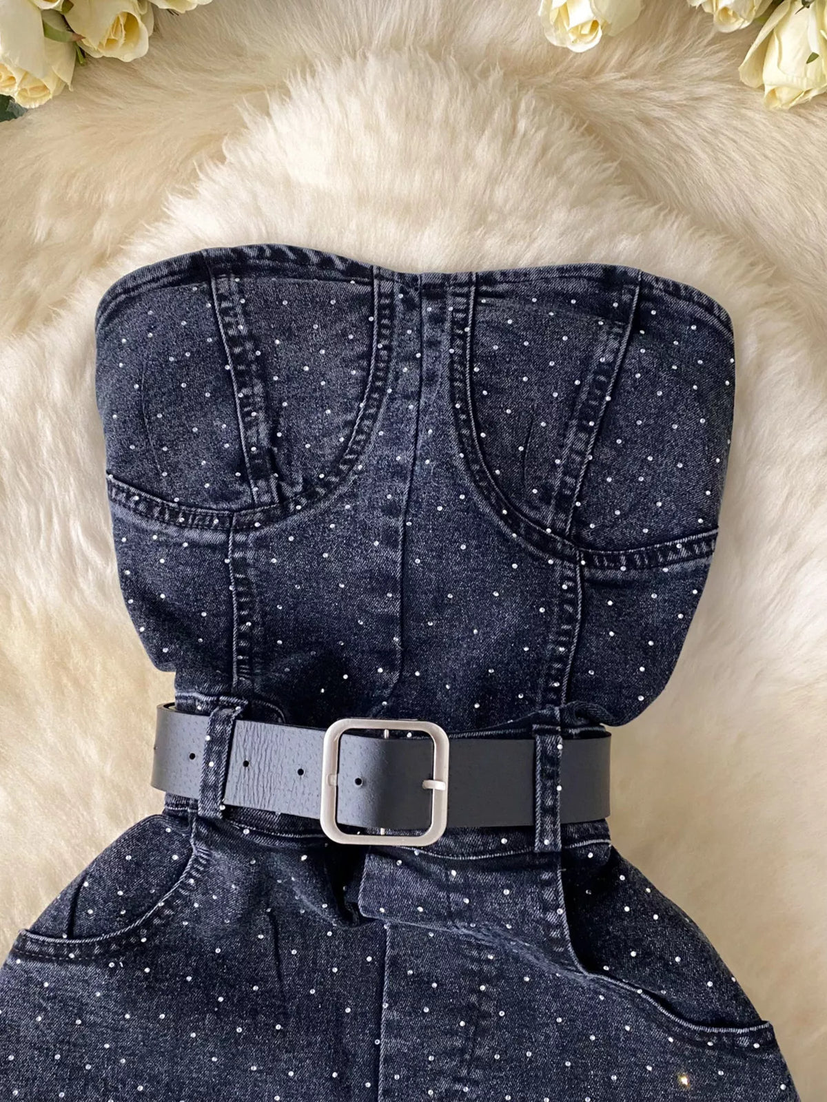 Blue strapless denim romper with diamante detail side view