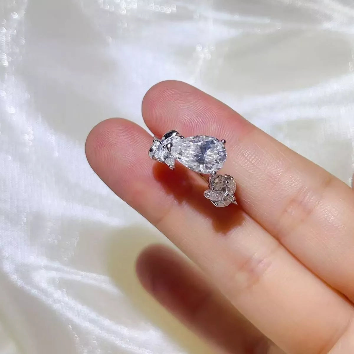 Moissanite ring worn on hand showing stone scale