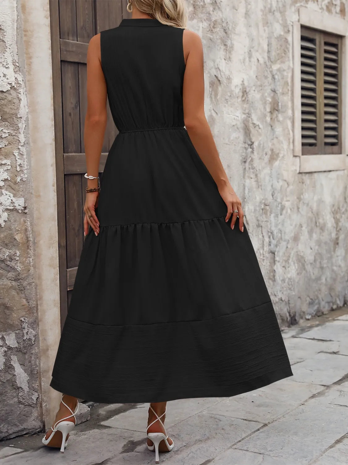 Notched sleeveless maxi tank dress, skirt and hem detail