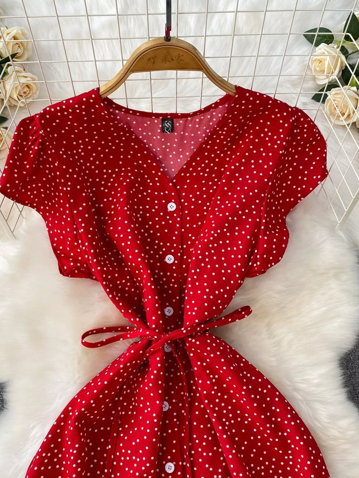 Red polka dot belted maxi dress back view