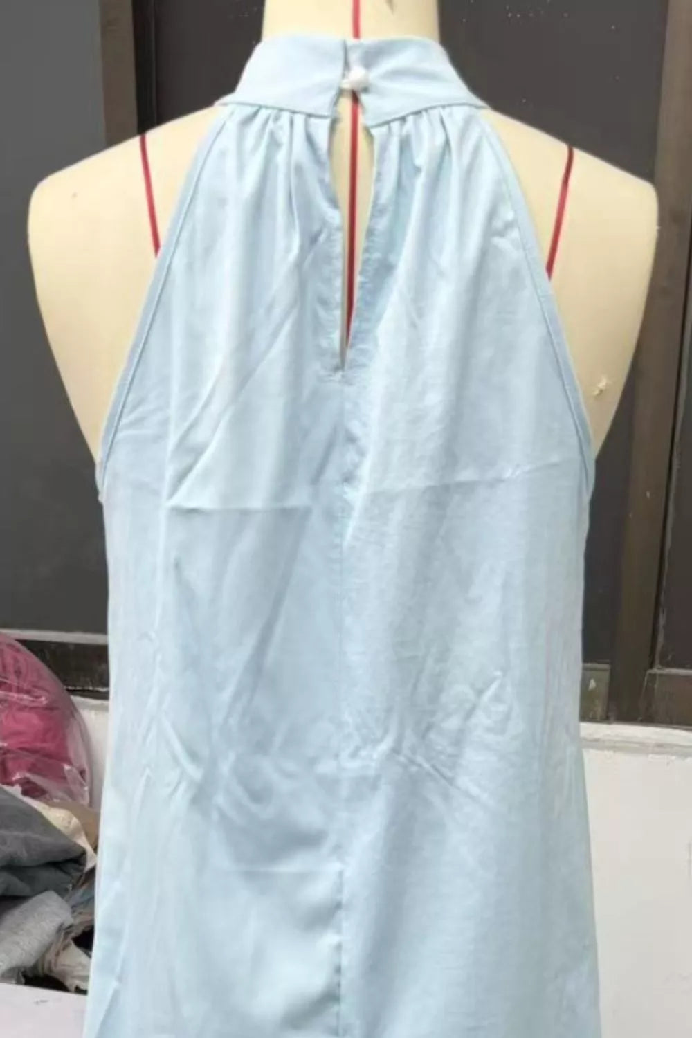 Halter neck sleeveless maxi dress with side slit full length view