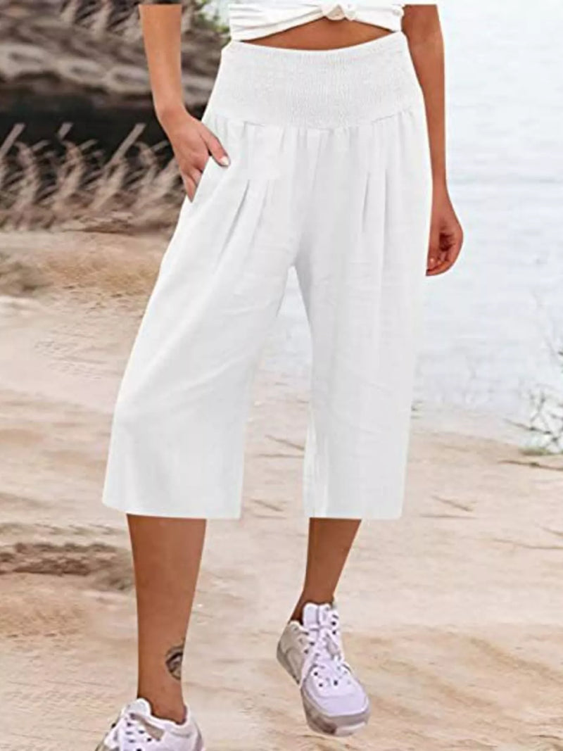 Smocked wide leg capri pants shown on a model