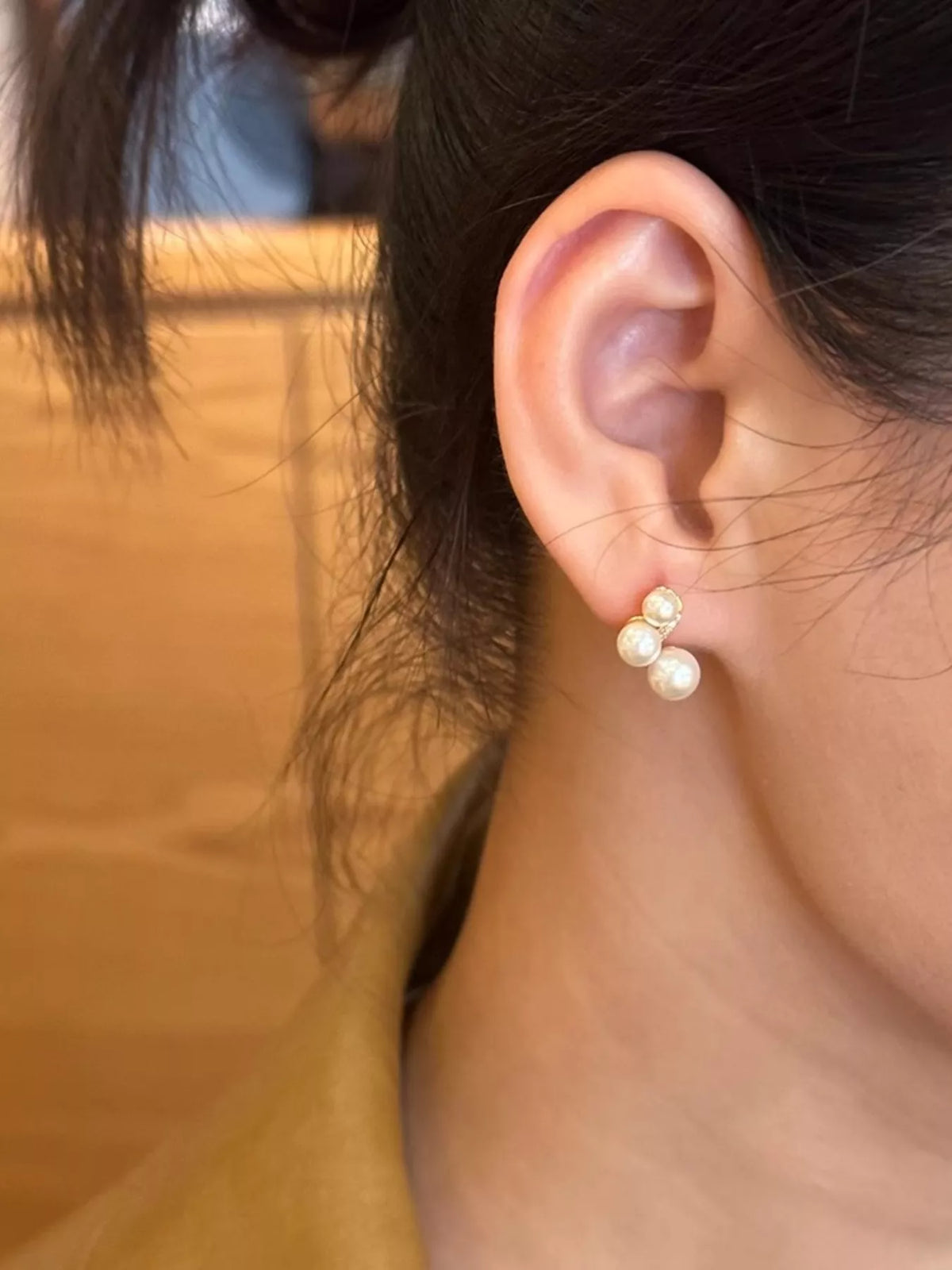 White pearl cluster stud earrings back view