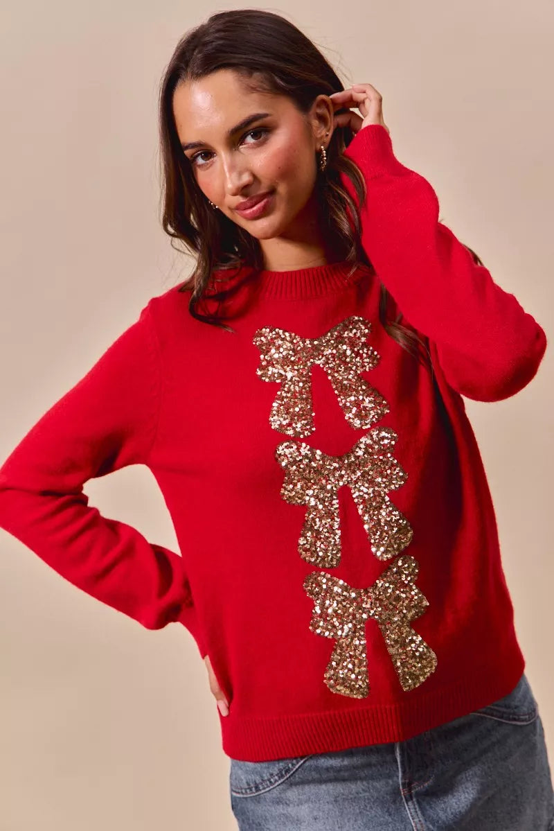 Sequin Bow Ribbon Christmas Sweater in Red and Gold on model
