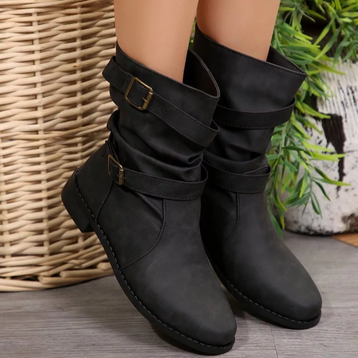 Buckled low heel boots back heel view