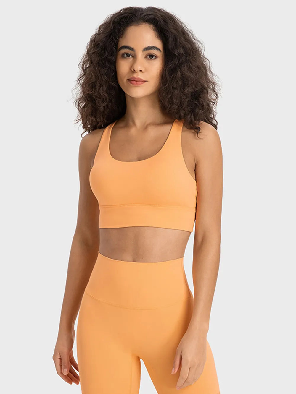 Crisscross scoop neck active tank movement view