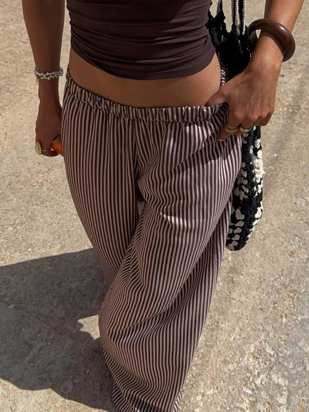 Brown striped tie waist wide leg pants back view
