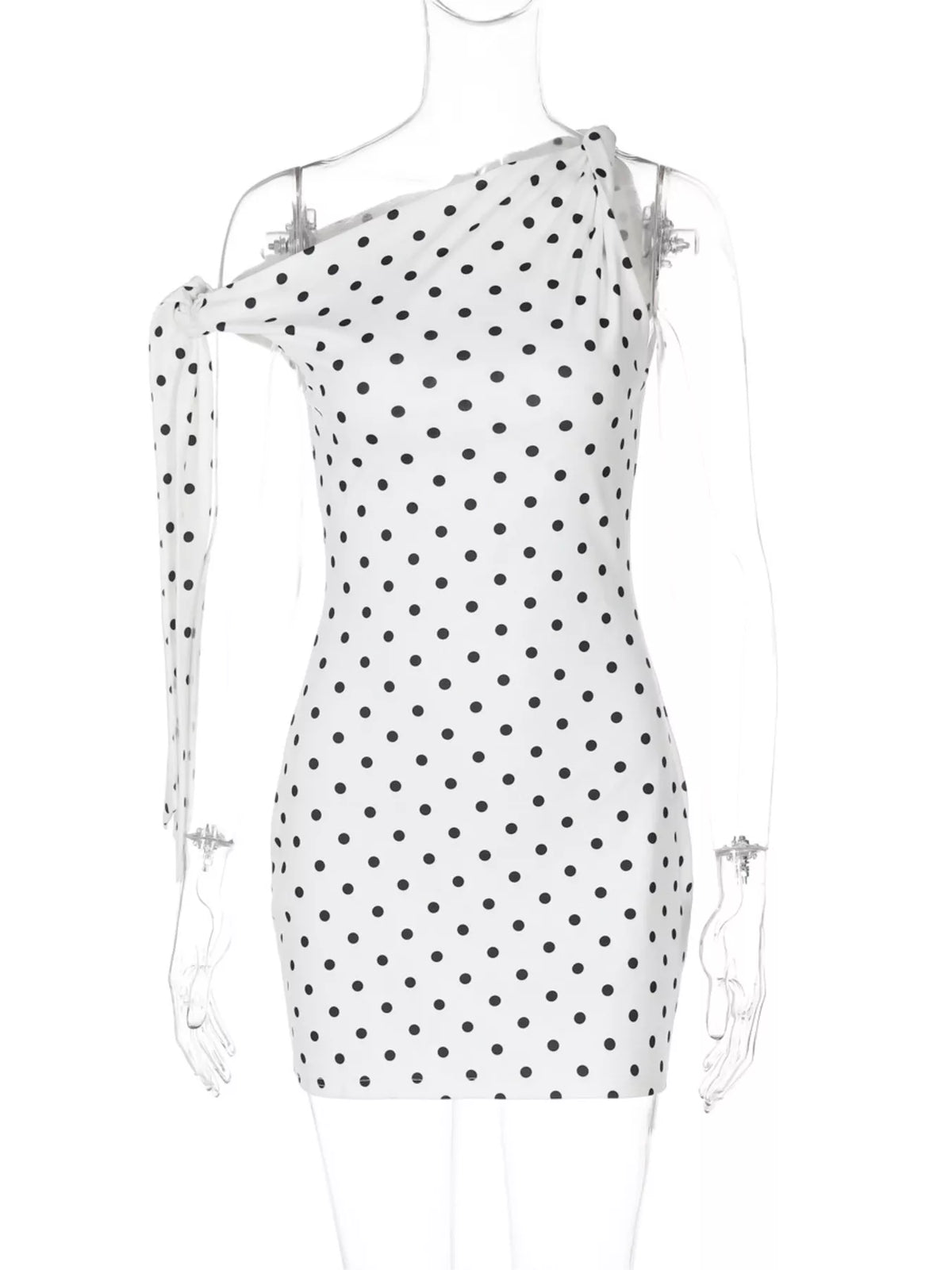 Back view of the black sleeveless polka dot dress