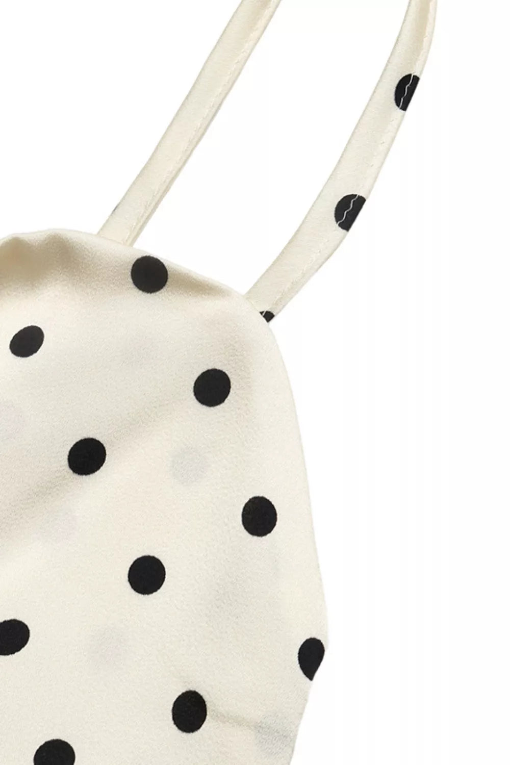 Cream polka dot maxi dress seated view