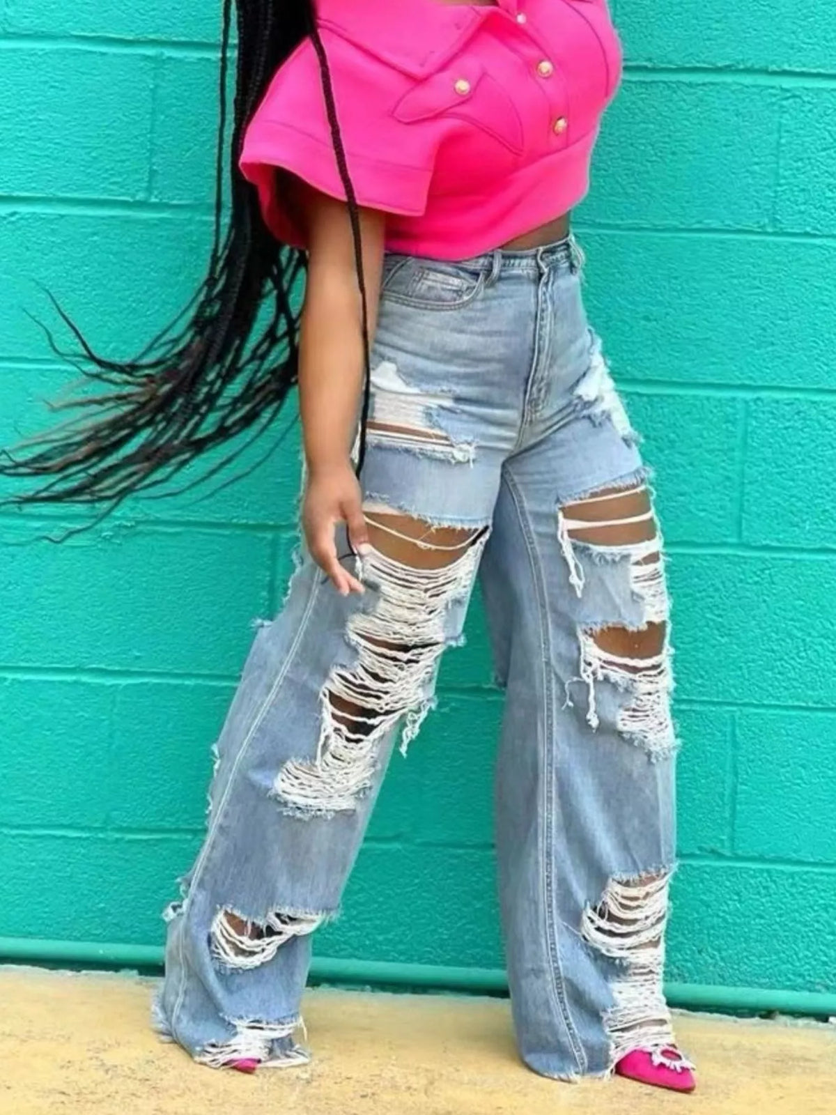 Wide leg distressed denim jeans side profile