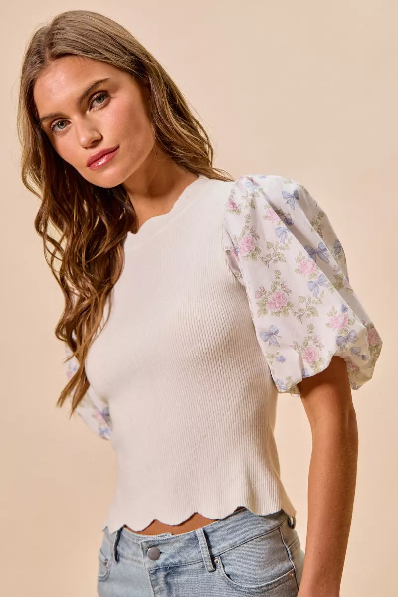 Floral print sweater top with contrast sleeves detail