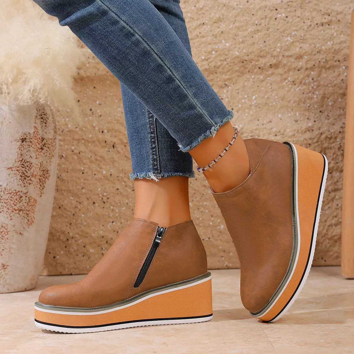 wedge ankle boots with zipper styled on model