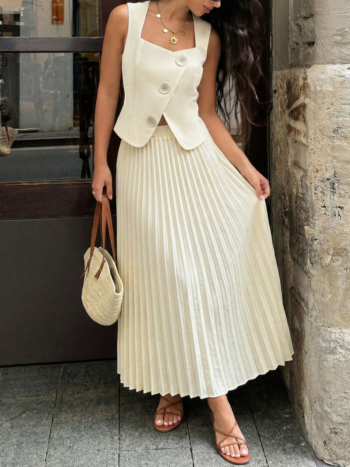 Sleeveless vest and pleated maxi skirt full outfit styled