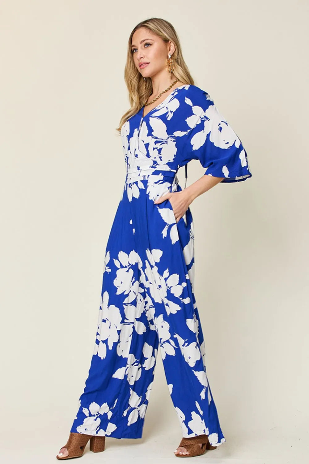 Wide leg jumpsuit tie back detail
