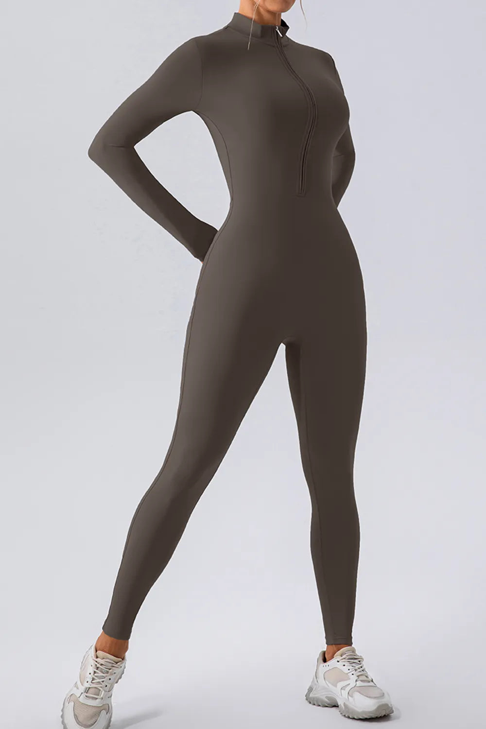 Half zip mock neck active jumpsuit styled look
