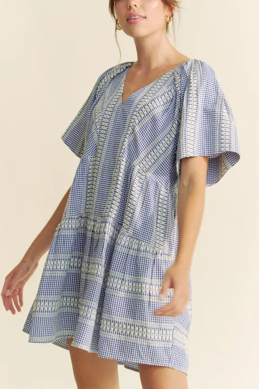 Embroidered Gingham Ruffle Mini Dress in Navy styled look