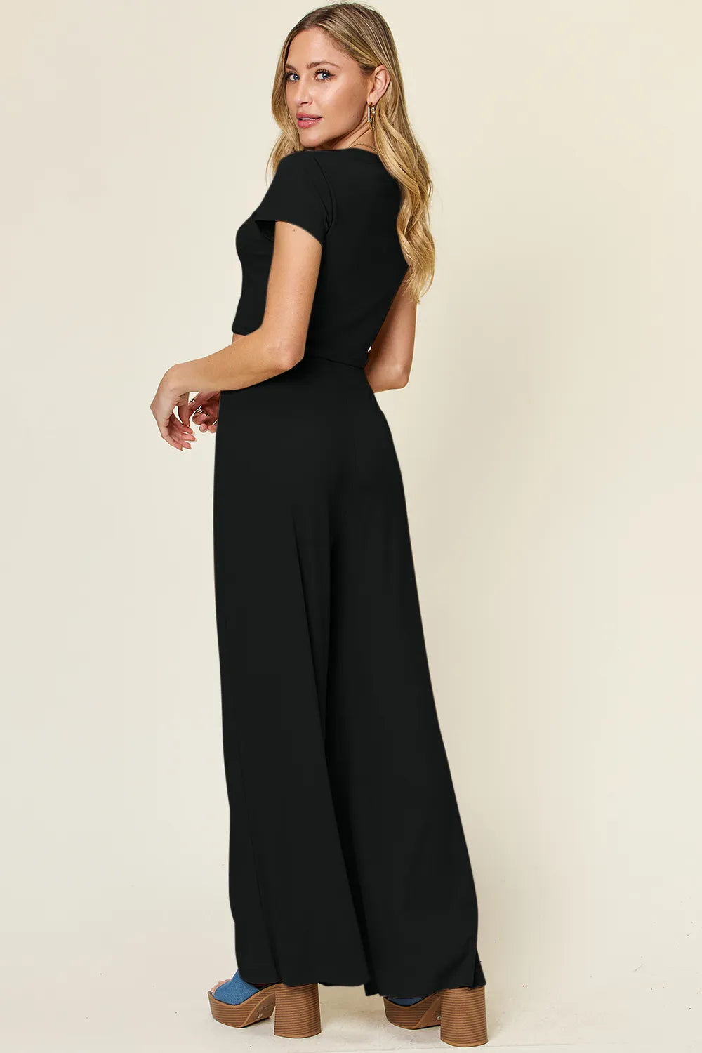 Side view of the two piece top and pants set