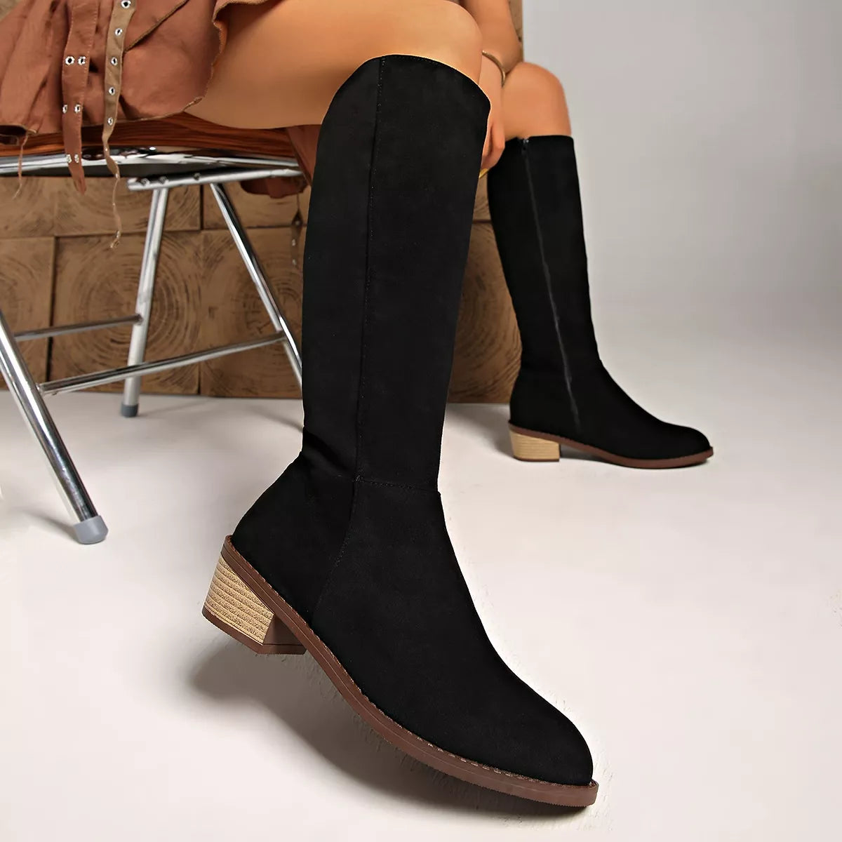 Knee high block heel suede boots heel detail