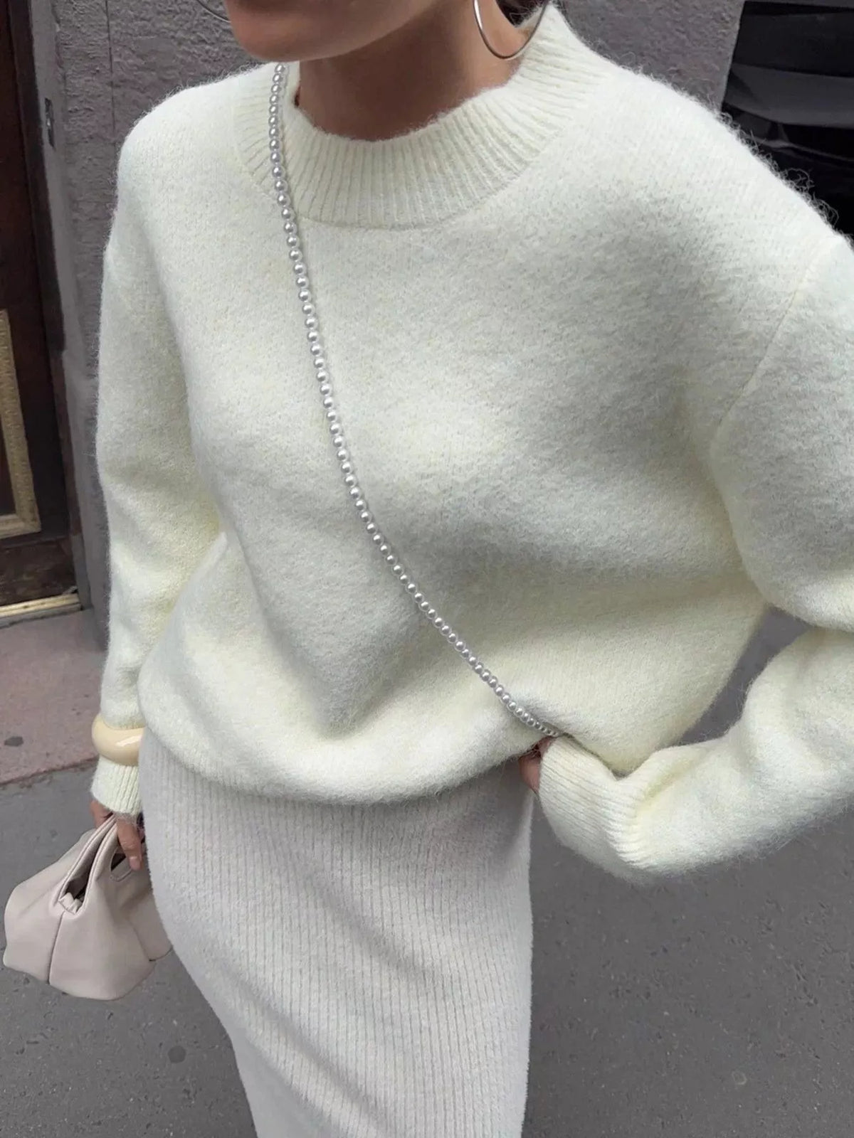 round neck dropped shoulder sweater side profile view