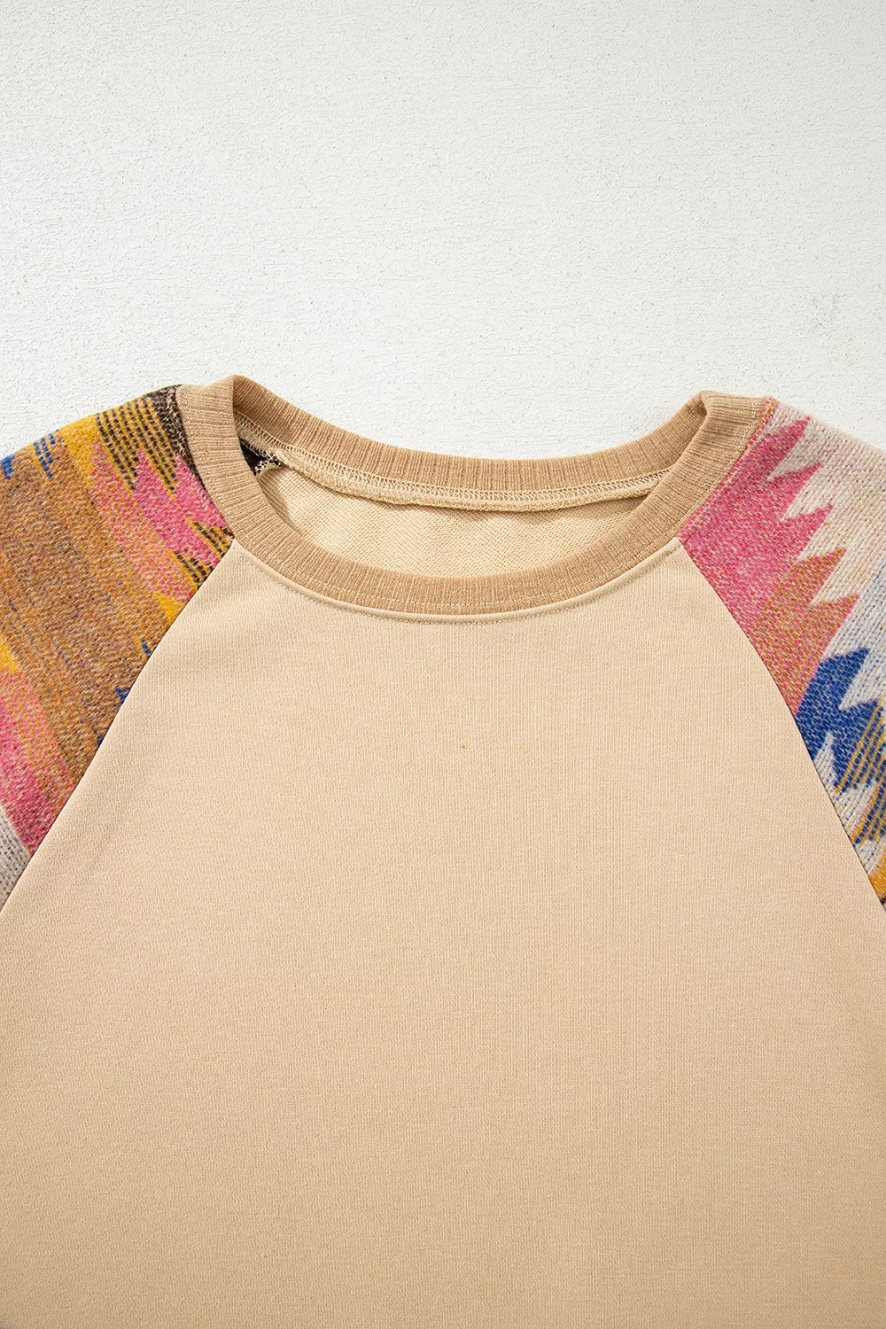 Western sweatshirt styled with denim jeans