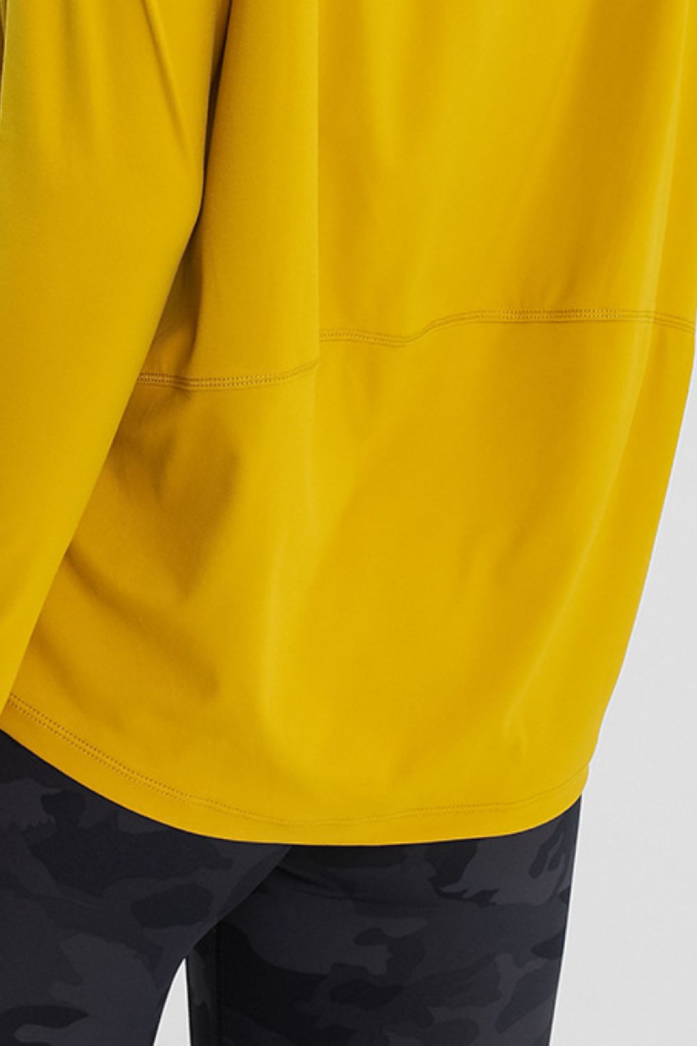 Loose fit active pullover top styled outfit view