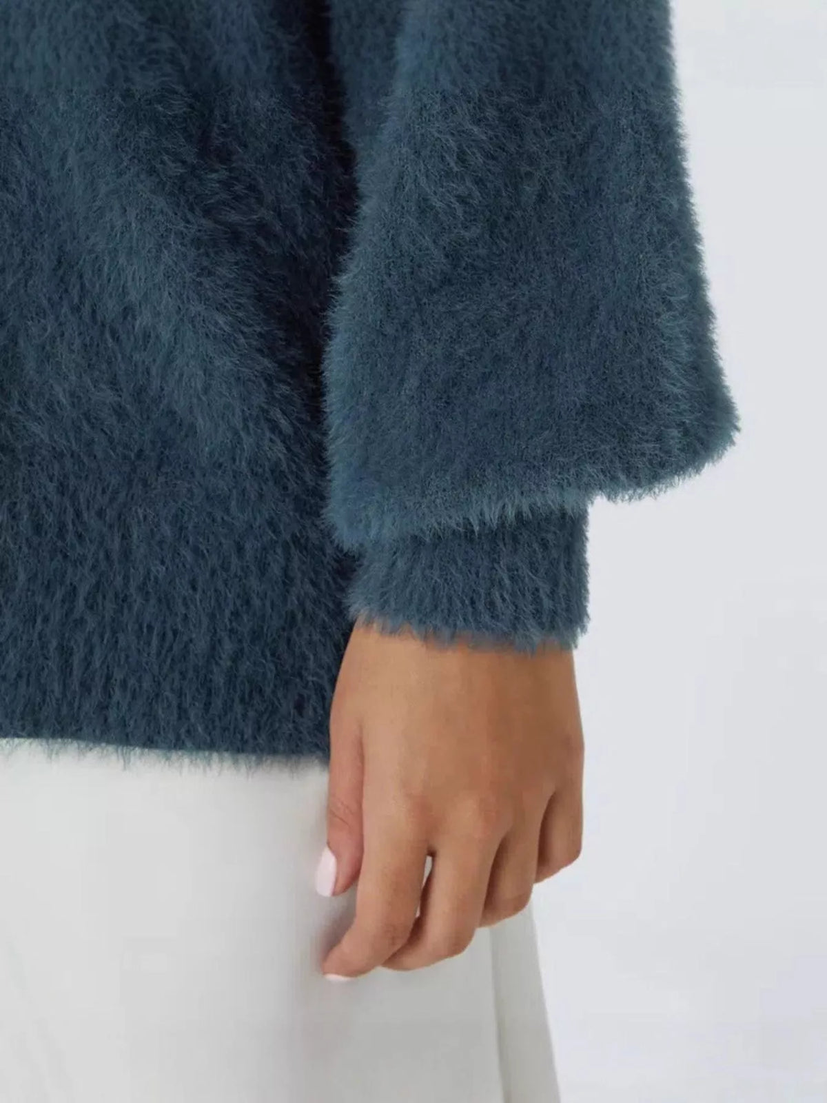 Cozy knit cardigan worn open layering