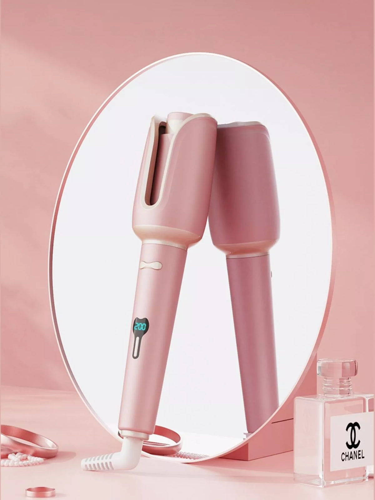 Curling iron in blush pink