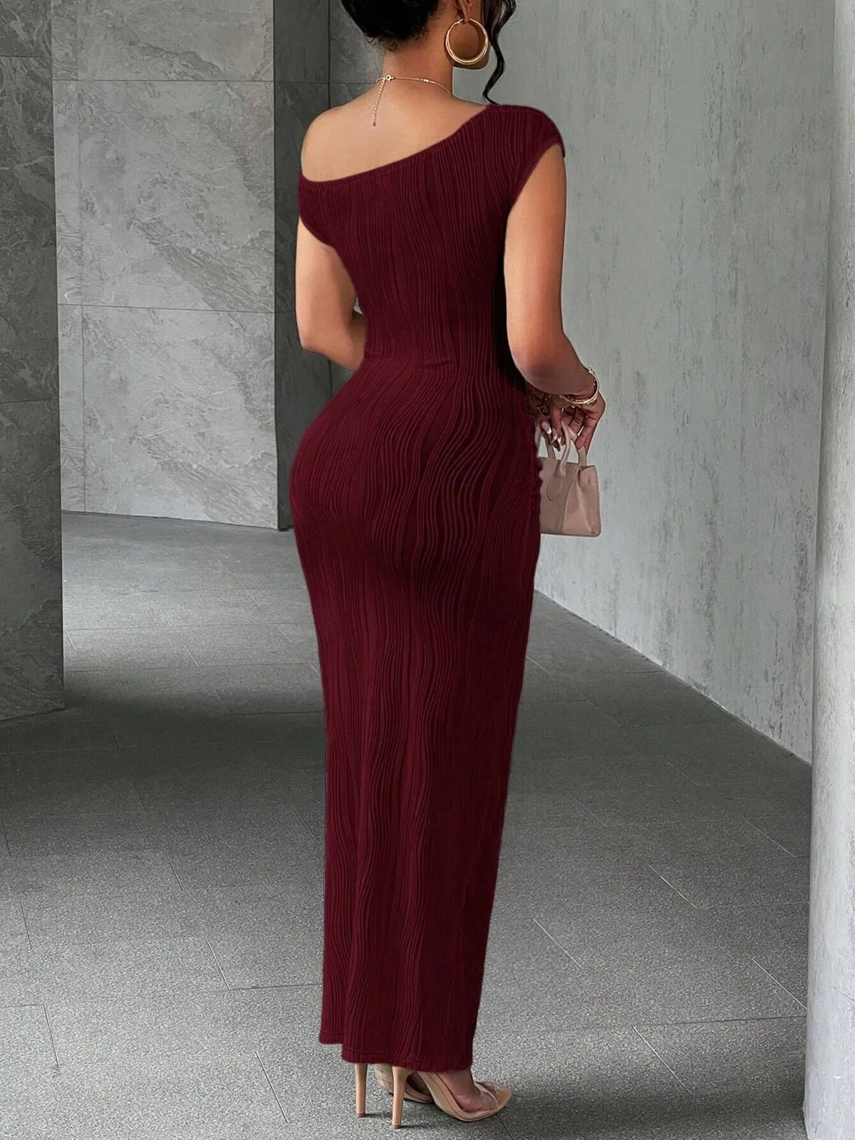 single shoulder ribbed bodycon maxi dress seated pose