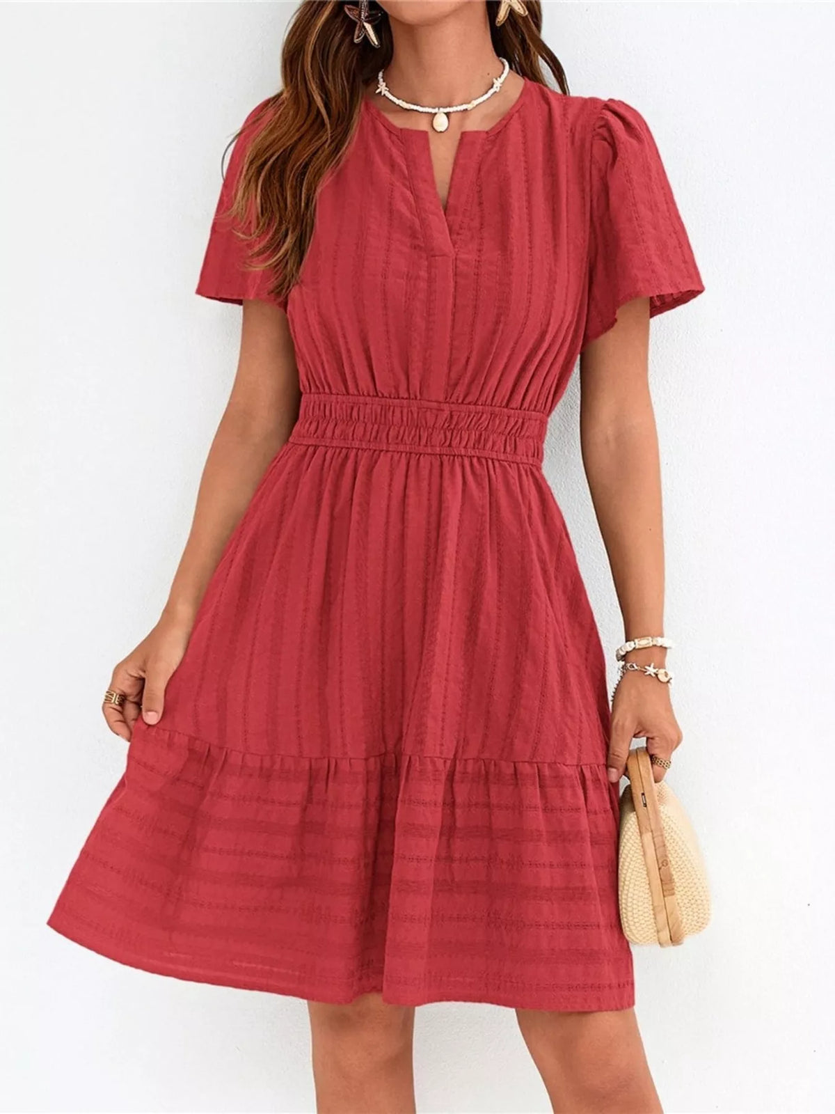 Short sleeve smocked waist tiered midi dress styled view
