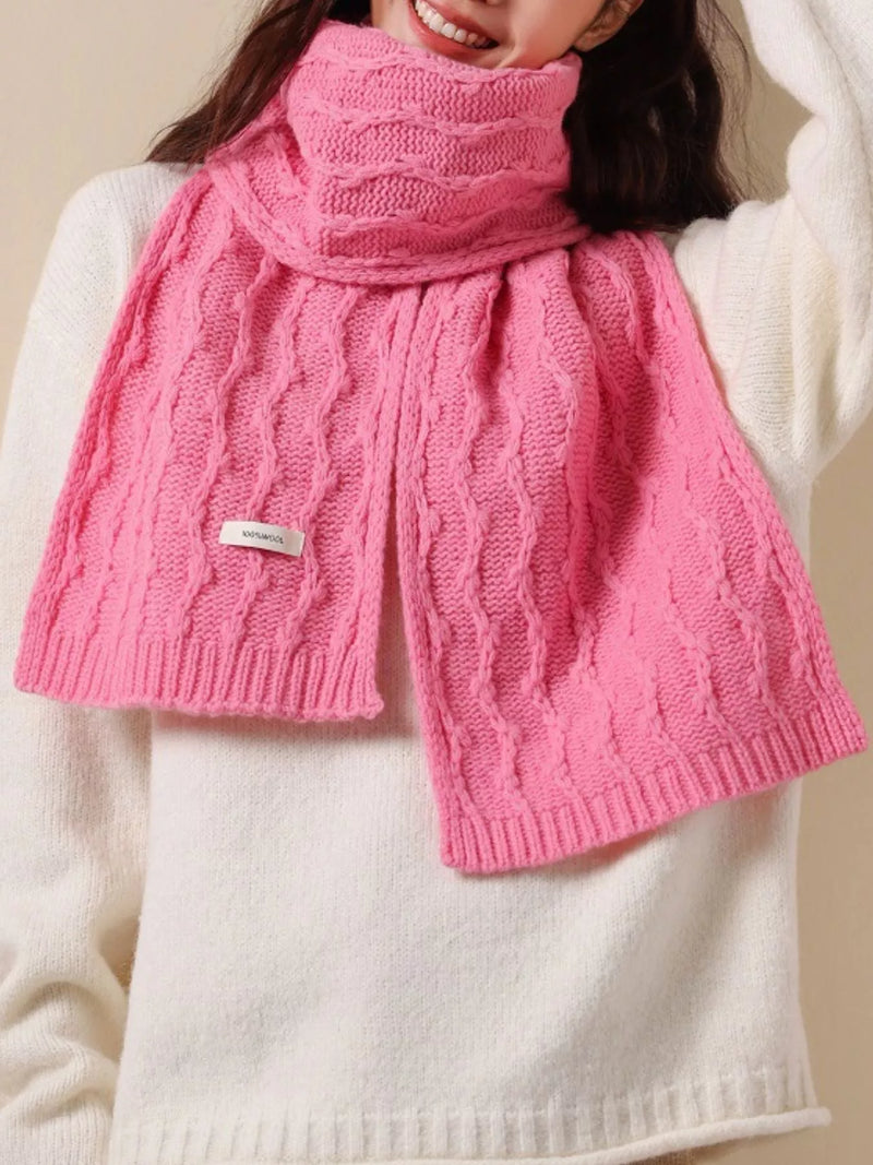 Wool cozy cable knit scarf wrapped at the neck