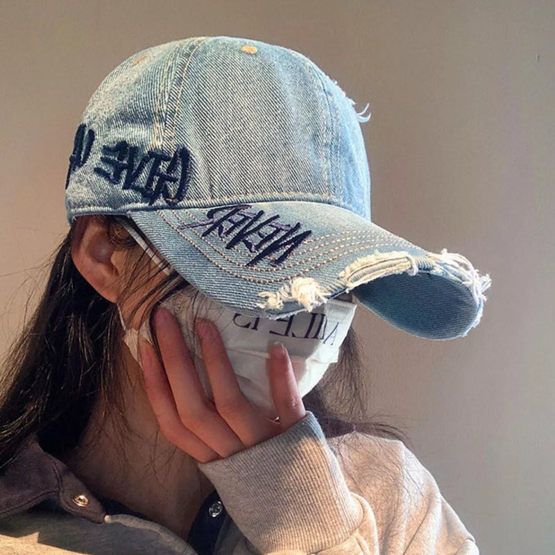 Distressed letter embroidered baseball cap in denim blue