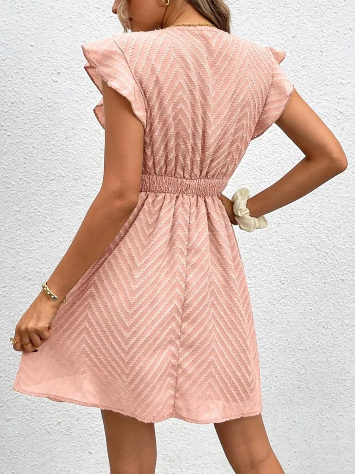 V neck ruffle sleeve mini dress, close up fabric detail