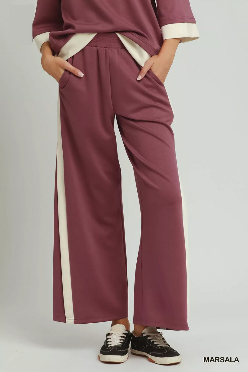 Umgee colorblock side stripe straight pants in marsala front view