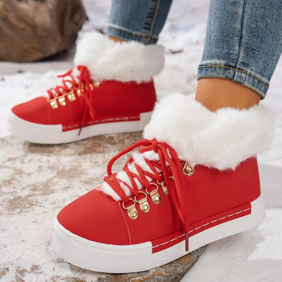 Fuzzy trim lace up ankle boots angled pair view